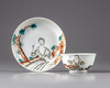 A Chinese en grisaille, sepia, and enamel-decorated European subject cup and saucer