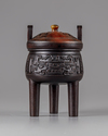 A CHINESE HARDWOOD ARCHAISTIC TRIPOD CENSER AND COVER, 19TH CENTURY