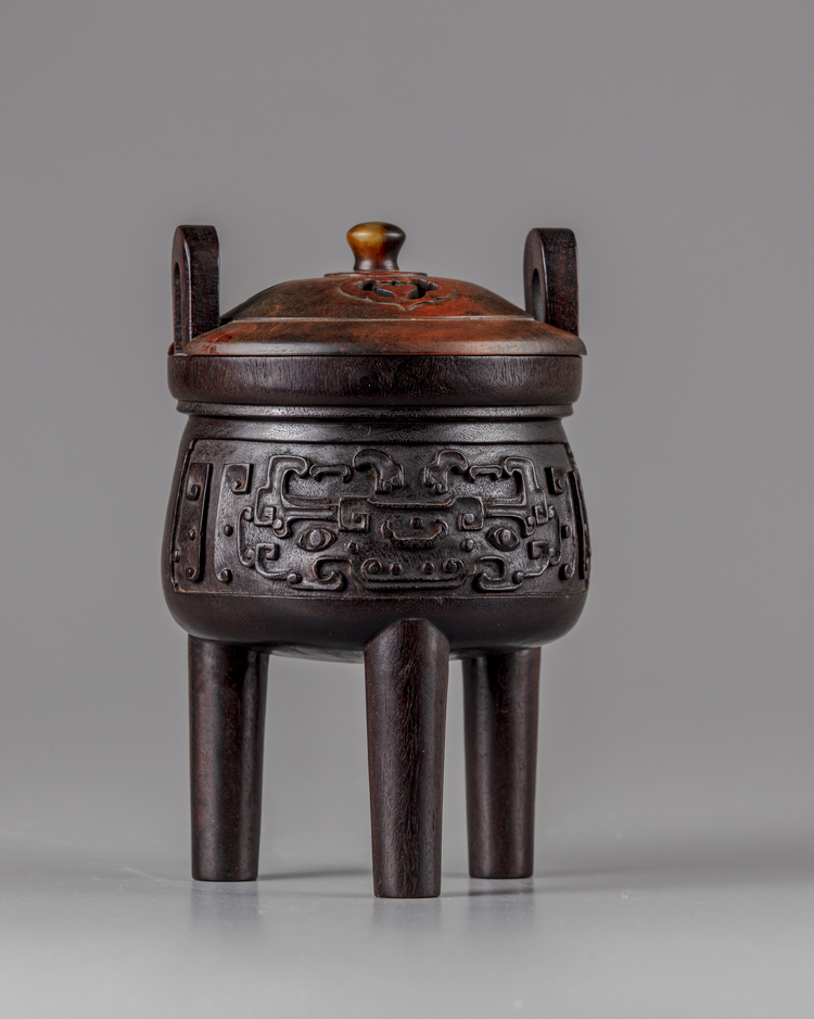 A CHINESE HARDWOOD ARCHAISTIC TRIPOD CENSER AND COVER, 19TH CENTURY