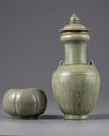 A celadon glazed vase with cover and a waterpot