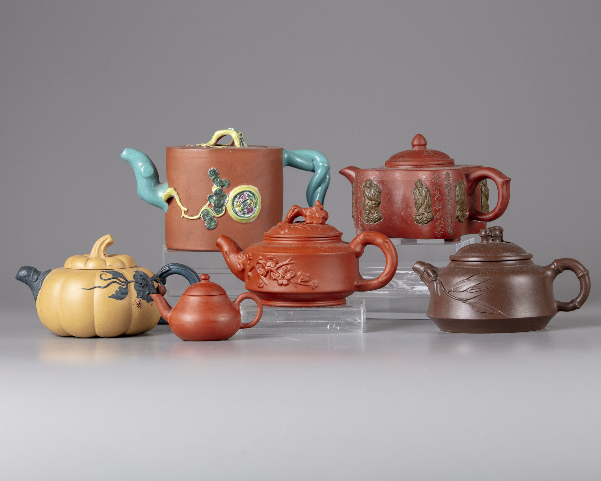 A GROUP OF SIX CHINESE YIXING TEAPOTS