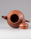A Chinese Yixing teapot and cover
