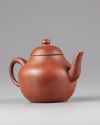 A Chinese Yixing teapot and cover