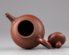 A large Chinese yixing teapot and cover