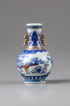 A famille rose blue and white miniature vase