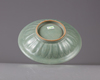 A CHINESE TWIN CARP CELADON BOWL, QING DYNASTY (1644-1911)