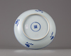 A Chinese blue and white ‘scrolling lotus’ dish