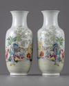 A PAIR OF CHINESE FAMILLE ROSE 'BOYS' VASES, 19TH-20TH CENTURY