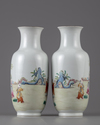 A PAIR OF CHINESE FAMILLE ROSE 'BOYS' VASES, 19TH-20TH CENTURY