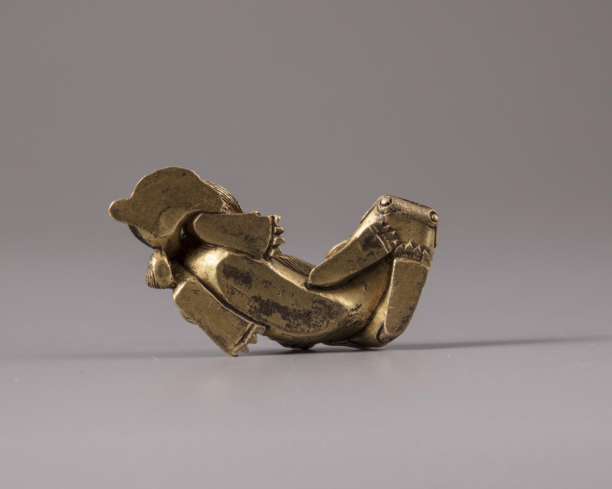 A gilt bronze paperweight