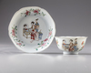 A Chinese famille rose ‘lady and boy’ lobed bowl and saucer