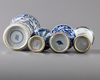 FOUR CHINESE BLUE AND WHITE GU VASES, 18TH CENTURY