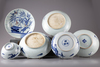 Five Chinese blue and white dishes and a bowl
