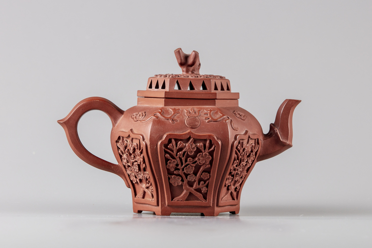 A Chinese hexagonal Yixing teapot