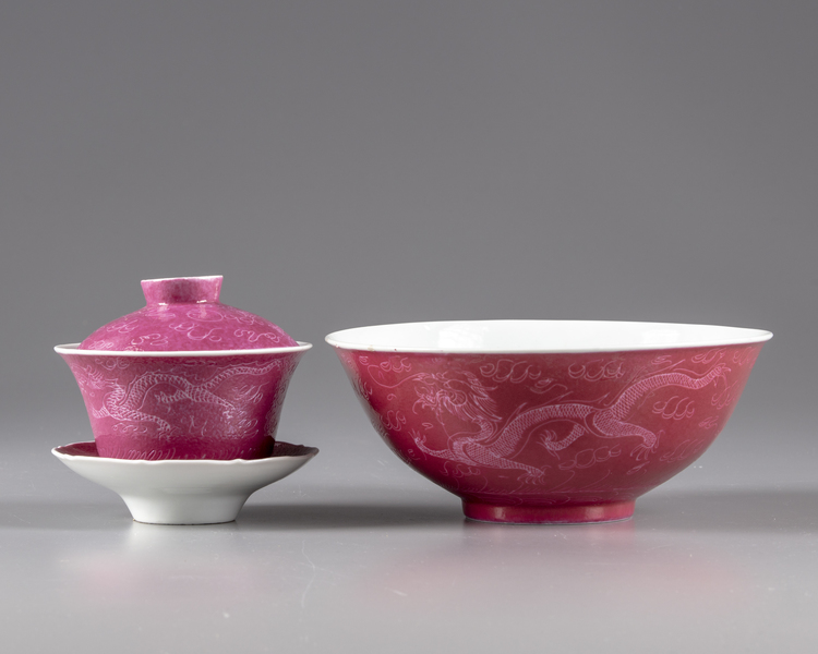 Two rose glazed bowls with a cover and a stand