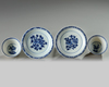 Two pairs of Chinese café-au-lait-ground blue and white cups and saucers