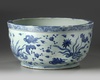 A CHINESE BLUE AND WHITE DUCKS AND LOTUS' BASIN, MING DYNASTY (1368-1644)