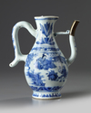 A silver-mounted Chinese blue and white ewer
