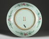 A Chinese famille rose 'nine peaches' charger