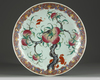 A Chinese famille rose 'nine peaches' charger