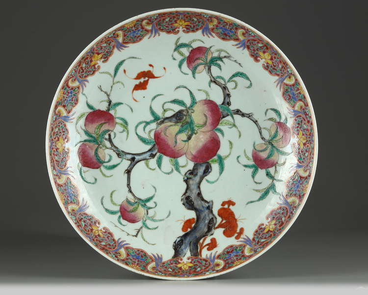 A Chinese famille rose 'nine peaches' charger