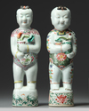 Two Chinese famille rose figures of boys