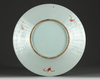 A Chinese famille rose 'nine peaches' charger