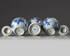 A pair of Chinese blue and white 'ladies' jars and covers and a 'figural' vase
