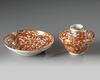 A CHINESE IRON-RED AND GILT-DECORATED 'DRAGON' OGEE BOWL, COVER AND SAUCER, GUANGXU PERIOD (1875-1908)
