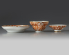 A CHINESE IRON-RED AND GILT-DECORATED 'DRAGON' OGEE BOWL, COVER AND SAUCER, GUANGXU PERIOD (1875-1908)