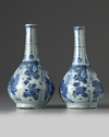 Two Chinese blue and white 'Kraak porcelain' bottle vases