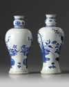 A pair of Chinese blue and white 'flower basket' vases