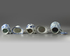 A GROUP OF FIVE CHINESE BLUE AND WHITE AND EN GRISAILLE POURING VESSELS