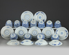 A set and a matched set of Chinese blue and white ‘flower scroll’ cups and saucers