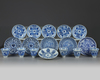A group of Chinese blue and white cups and saucers