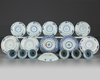 A group of Chinese blue and white cups and saucers