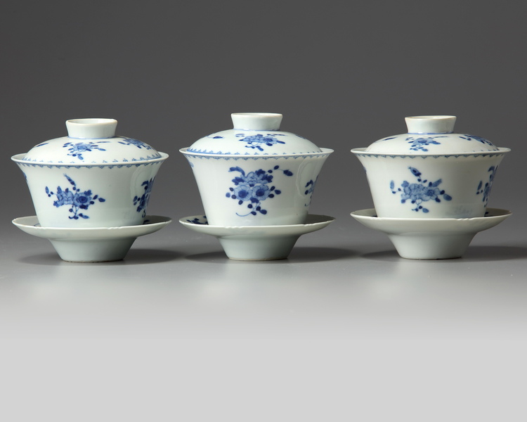 Three sets of Chinese blue and white bowls, covers and saucers