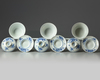 Three sets of Chinese blue and white bowls, covers and saucers