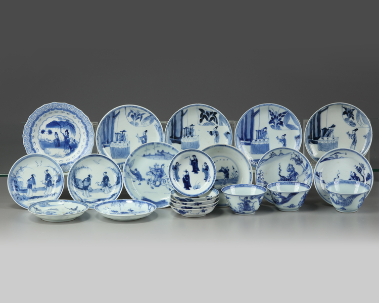 A group of Chinese blue and white 'figural' cups and saucers