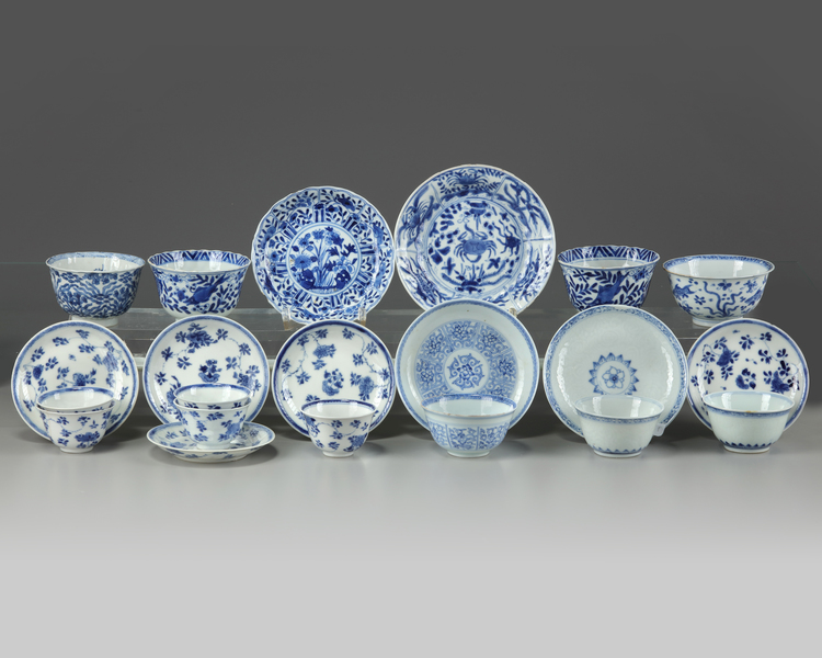 A group of Chinese blue and white cups and saucers