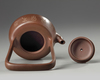 A Chinese yixing teapot and cover