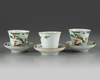 Three pairs of Chinese famille verte cups and saucers
