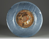 A Chinese blue-ground slip-decorated Zhangzhou ‘Swatow’ dish