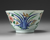 A CHINESE WUCAI 'FLORAL' BOWL, 17TH CENTURY