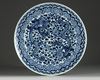 A Large Chinese blue and white 'dragon and flower' charger