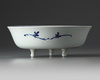 A Chinese blue and white pierced tripod basin