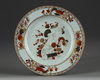 A CHINESE IRON-RED AND GILT-RED DECORATED 'SCROLL' PLATE, CHINA, QIANLONG PERIOD (1736-1795)
