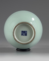 A Chinese pale celadon-glazed slender vase