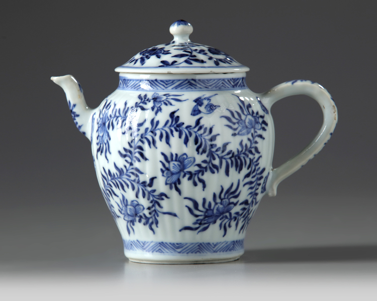 A Chinese blue and white moulded teapot