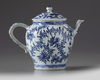 A Chinese blue and white moulded teapot